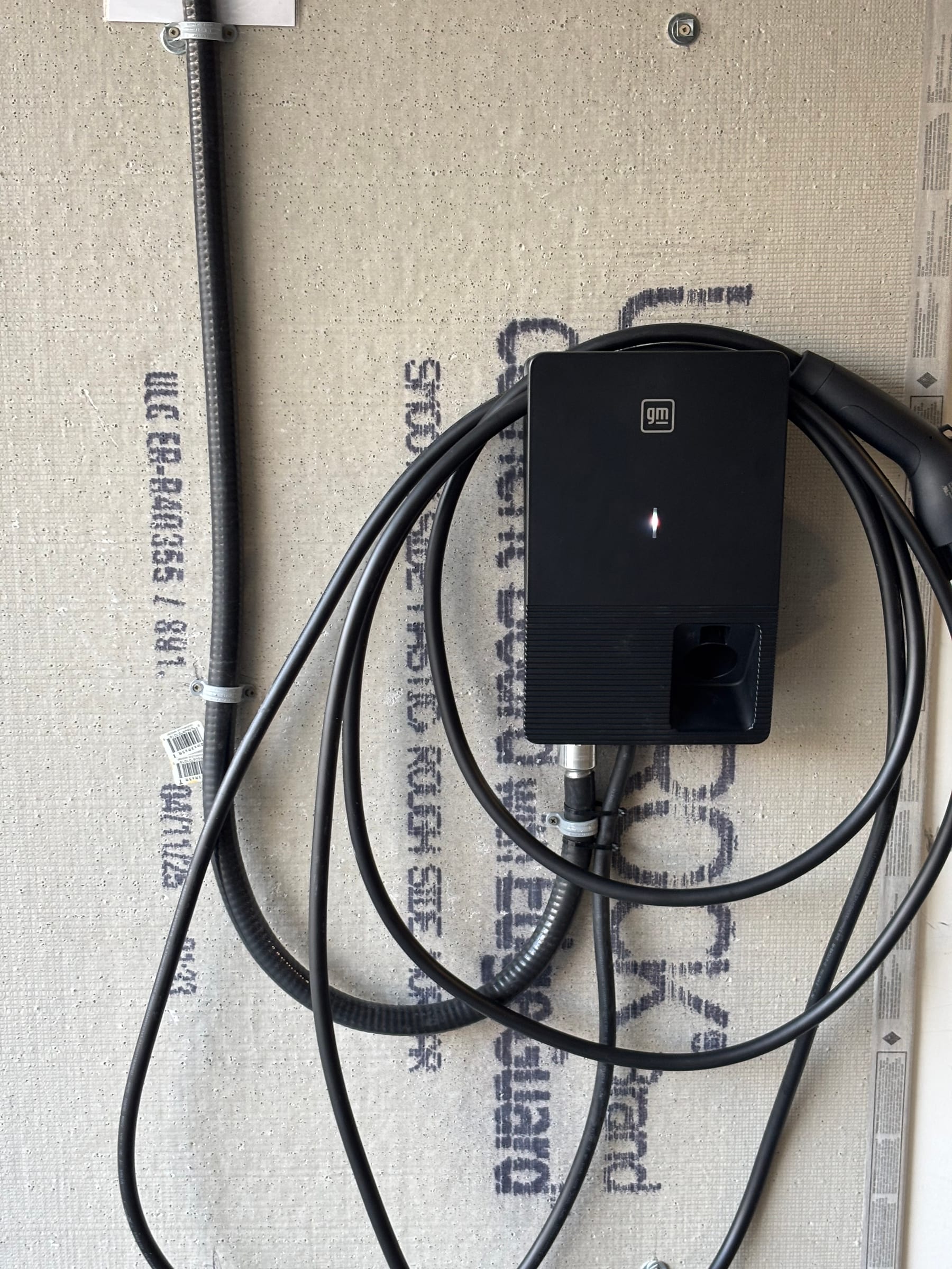 EV charger and charging cable installed by Call Paul Contracting in Edmonton