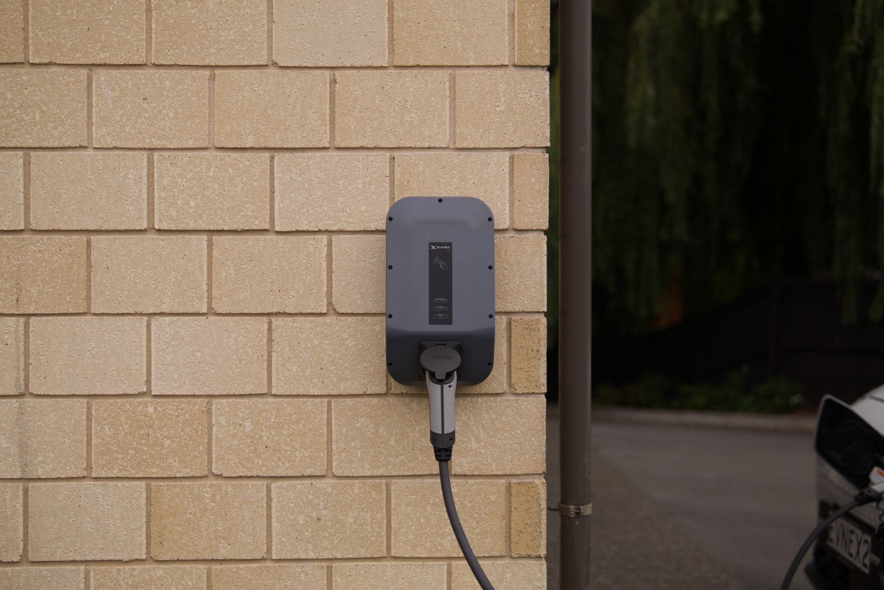 Wall-mounted Level 2 EV charging station installed by Call Paul Contracting, Edmonton