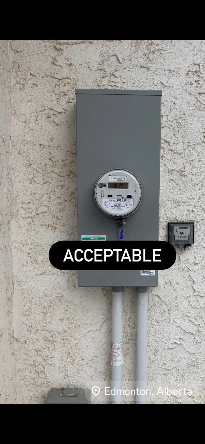 Electrical meter base marked acceptable after a safety inspection by Call Paul Contracting, Edmonton
