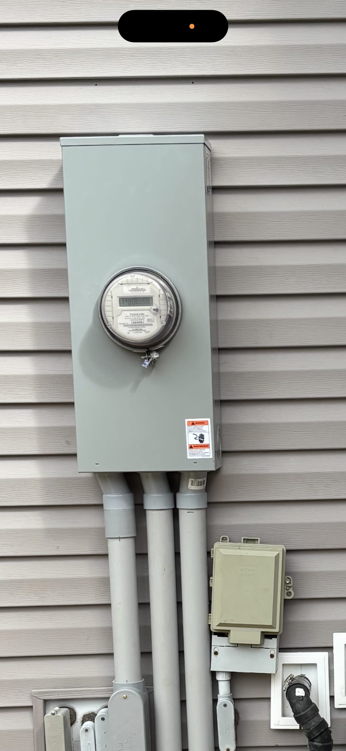 New meter base and service conduits installed by Call Paul Contracting, Edmonton